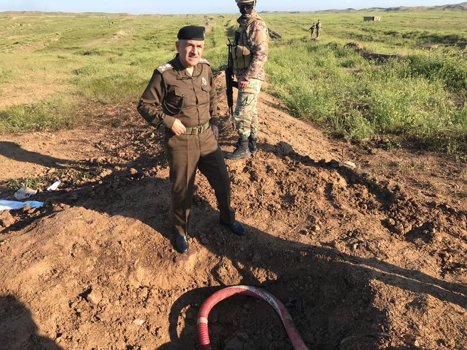 Police forces in Kirkuk confiscate two trucks in the site of an oil robbing, April 18, 2019. (Photo: Energy Police in Kirkuk)